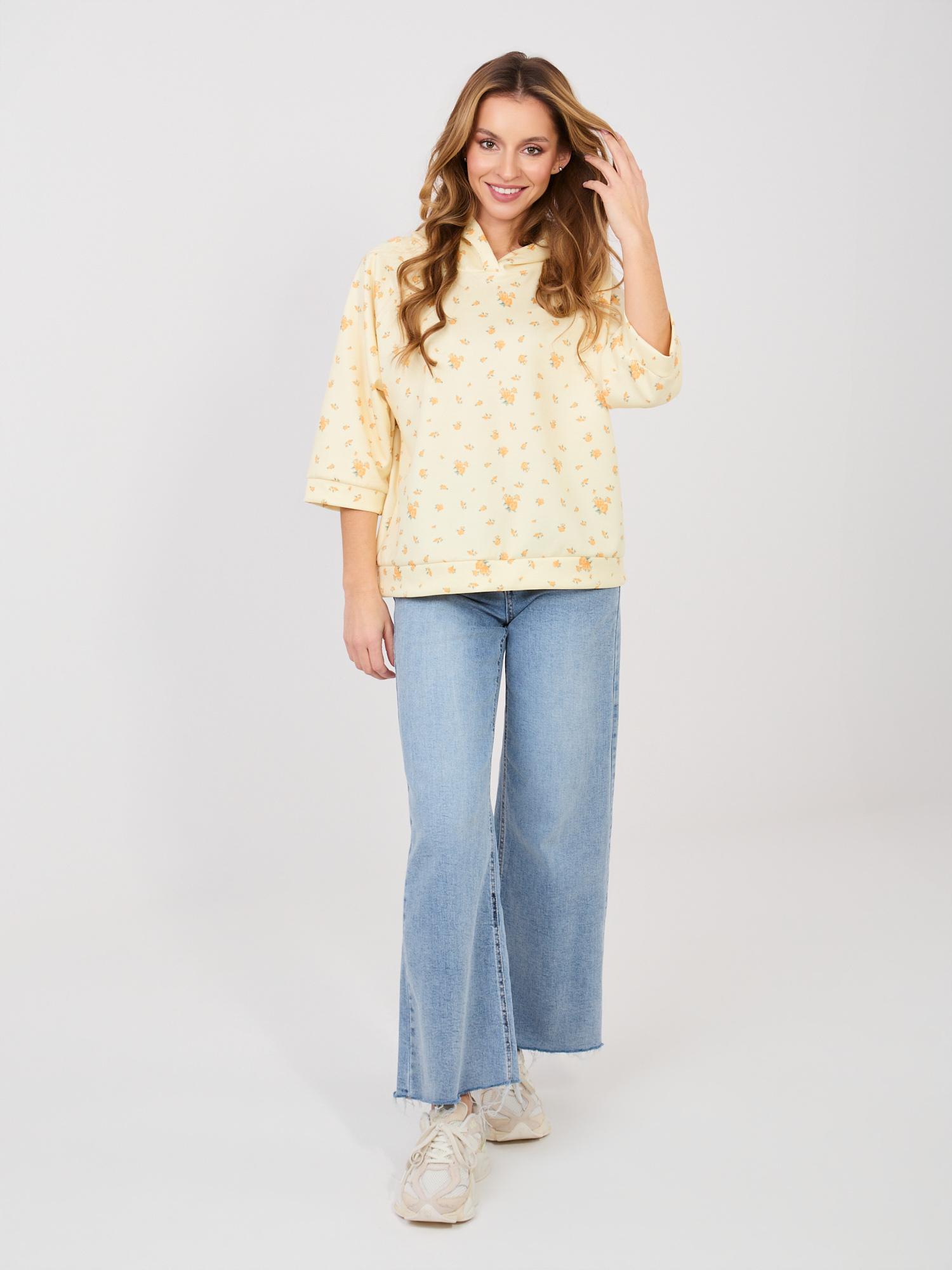 Pastelowa żółta damska bluza oversize z kapturem