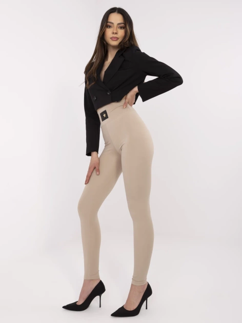 Beżowe damskie legginsy z dżetami 