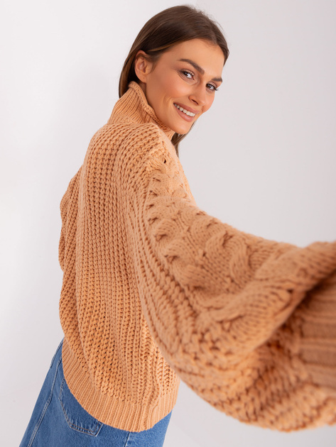Brzoskwiniowy damski sweter oversize z golfem  
